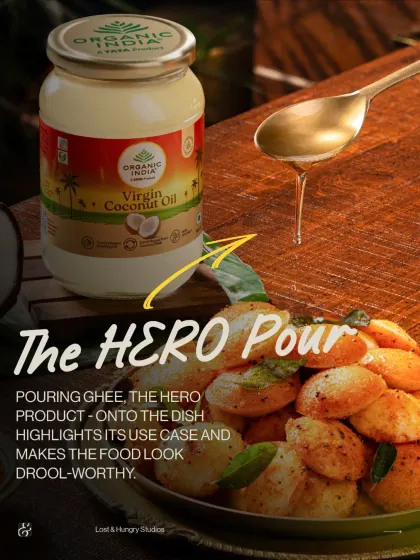 The "Hero Pour" for Organic India's Virgin Coconut Oil. Pouring the oil over hot mini idlis not only highlights its use case but also creates a mouthwatering action shot that makes the food look irresistible.