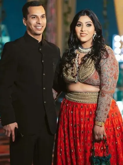 A stylishly dressed couple at an upscale evening event. We are experienced in shooting in a variety of venues, from banquet halls to outdoor lawns.