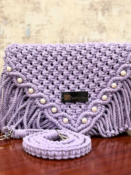 This lavender sling bag is one of my favorites! The pearl embellishments add a touch of elegance to the boho design.