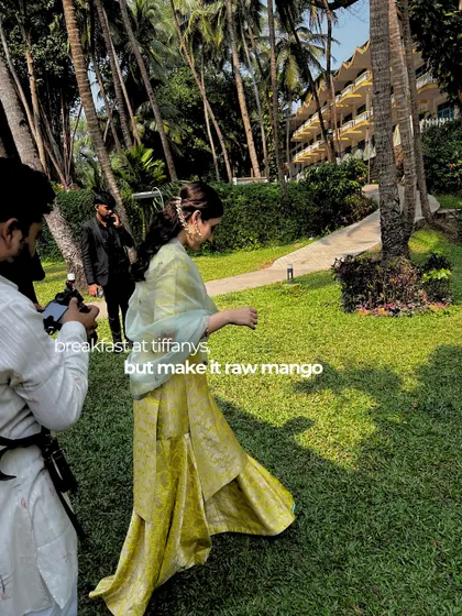 "Breakfast at Tiffany's, but make it Raw Mango." The bride's effortless style captured in a candid walk through the lush Goan landscape.