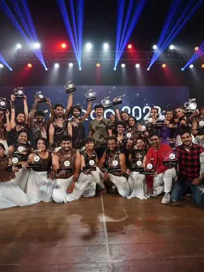 The entire cast and crew of Prayaan 2023. A moment of celebration with all our performers, instructors, and backstage crew holding their well-deserved trophies.