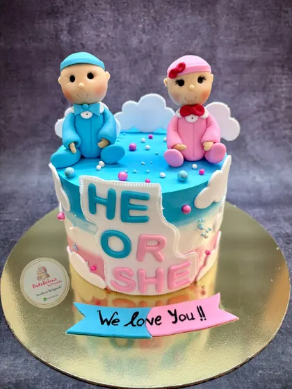What will it be? This "He or She" gender reveal cake is one of my favourite ways to celebrate a new arrival. I handcraft the adorable baby boy and girl toppers from fondant for that sweet surprise moment.