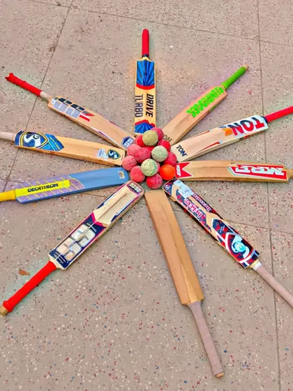 The tools of the trade. This creative arrangement of bats and balls by our junior players shows their passion and love for the game.