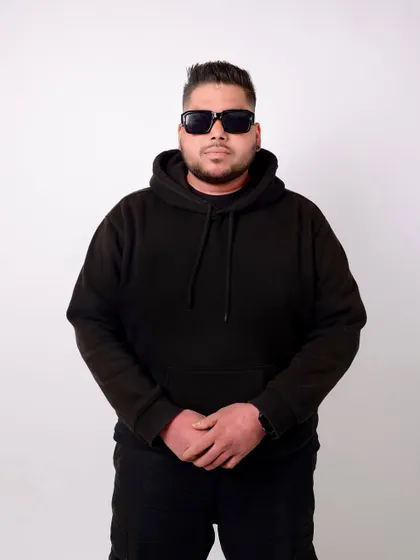 Strong, focused, and unstoppable. A simple but powerful portrait against a clean white background.