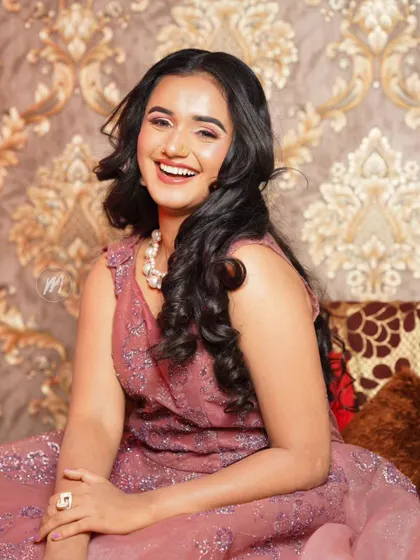 Her genuine smile shows how comfortable and confident she feels. That is always my ultimate goal.