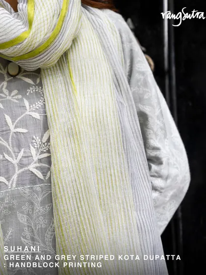 The Suhani green and grey striped Kota dupatta, paired here with a Chikankari kurta. The combination of crafts and textures creates a look that is rich in heritage and style.