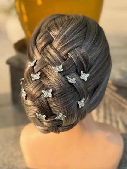 A slightly different angle of the beautiful basket-weave updo, showing the dimension and precision of the braiding technique.