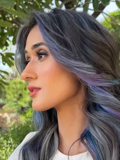 A side profile of the ash, lilac, and blue look, showing the subtle interplay of the different cool tones.