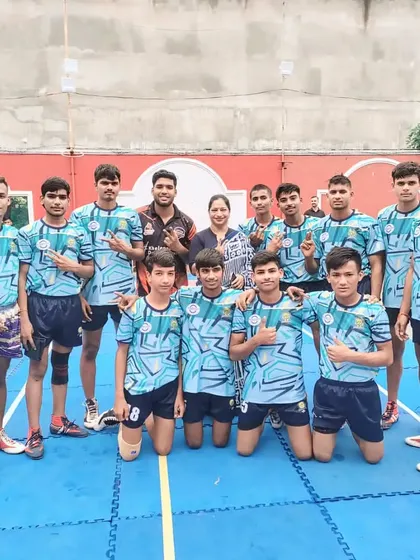 A proud team photo of our young Kabaddi players in their official academy kits.