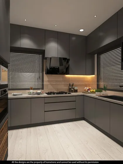 This shot highlights the thoughtful layout of the kitchen, with the hob, sink, and preparation areas all within easy reach.