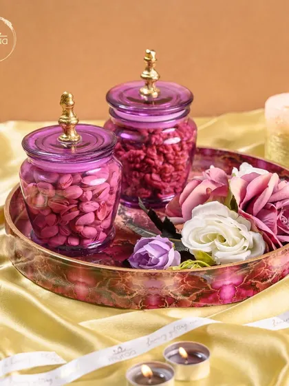 Another one of my exclusive Karwa Chauth hampers. This one features rich purple jars on a matching tray, filled with treats to make the day even more special for your loved ones.
