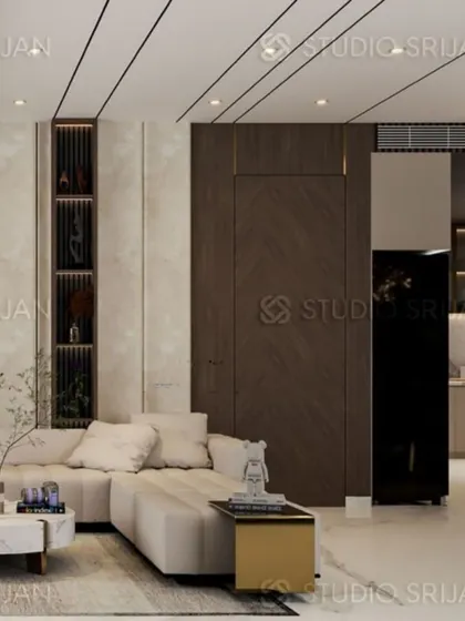 A close-up of the seating arrangement in the Krishna Park project, showing the clean lines of the furniture and the elegant chevron pattern on the wooden door.