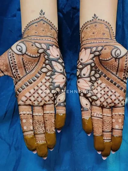 A beautiful Indian henna design with prominent lotus motifs.