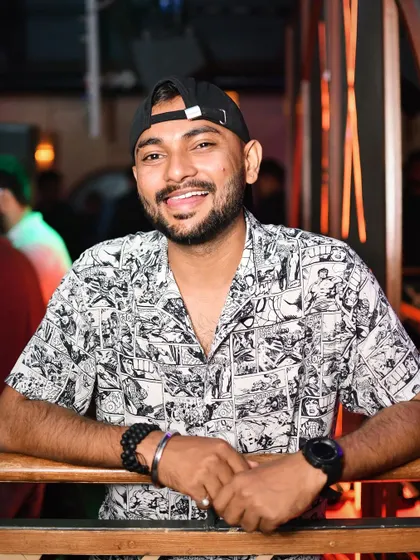 All the statistics in the world can't measure the warmth of a smile. A relaxed and happy portrait from a Sunday night gig.