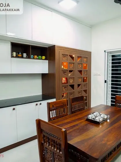 A duplicate image of the elegant dining area with the integrated pooja and crockery unit in Sithalapakkam.