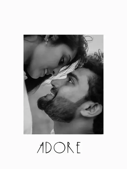 A simple and elegant black and white close-up, captioned "Adore," focusing on the couple's loving gaze.