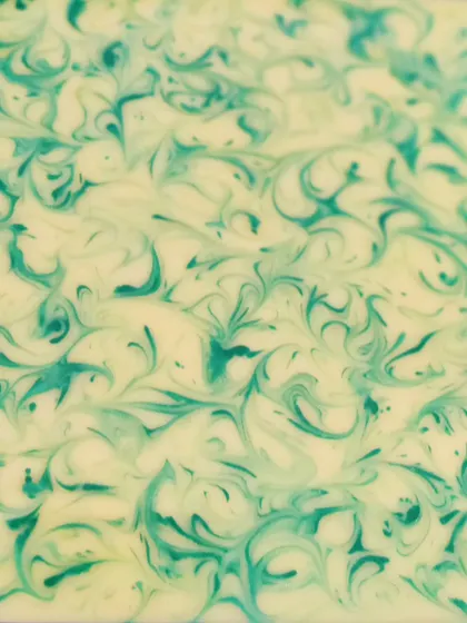 The top of the Aloe Vera soap loaf, showing the beautiful green swirls before it's cut.