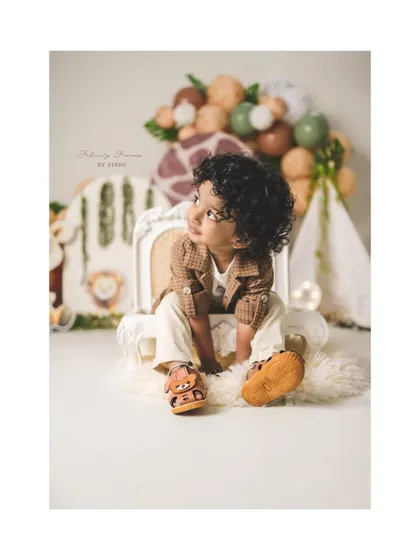 A thoughtful look from this two-year-old during his safari-themed birthday session.