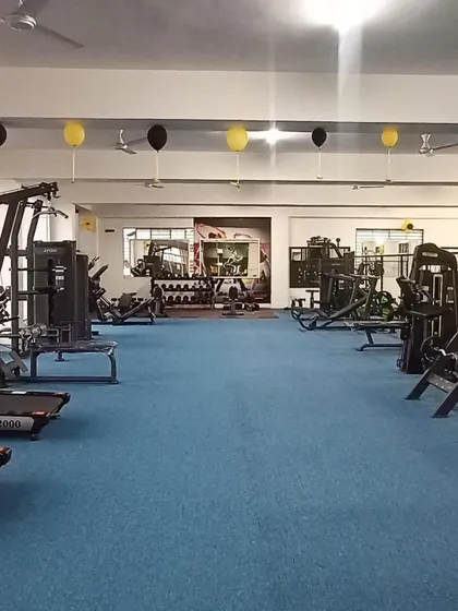 Another look at our spacious and well-lit gym floor, designed to make you feel motivated and comfortable during your workout.