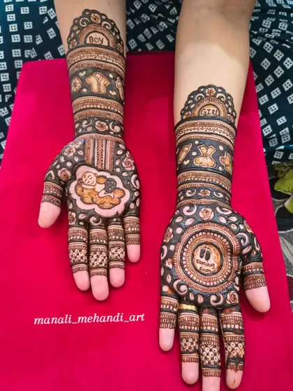 A cute and modern baby shower mehandi with a baby portrait on one hand and tiny footprints on the other. The design uses bold lines and circular patterns for a contemporary feel.