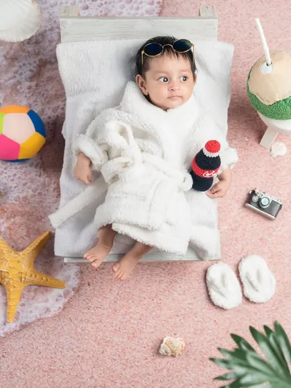 Wide awake and ready to chill. This little one is enjoying his beach vacation.