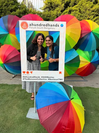 Two thumbs up for a day well spent. Visitors enjoying the lively and colourful atmosphere at our photo booth during The Monsoon Collective.