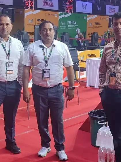 With fellow coaches and officials at an IBA event. We are part of a larger community dedicated to promoting the sport of boxing in India.