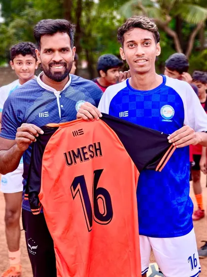 A player proudly holding up his new BPSS jersey. This moment marks the beginning of a new chapter in a player's football career with us.