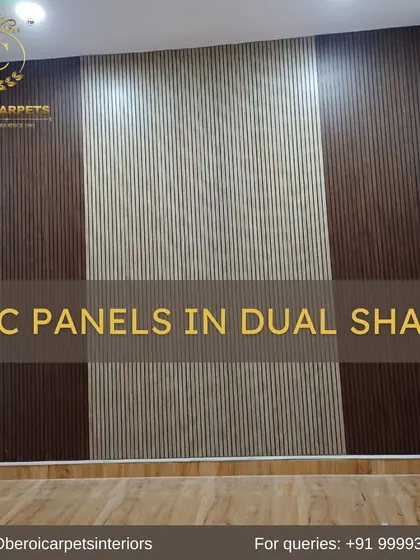 Create a unique look by combining different finishes. This feature wall uses a dual-shade design, pairing dark wood-grain WPC panels with a lighter, cream-colored fluted panel for a balanced and stylish contrast.