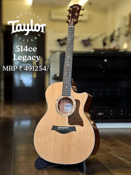 The Taylor 514ce Legacy model, a Grand Auditorium guitar with a Western Red Cedar top. This tonewood is known for its responsiveness to a light touch, making it a fingerstyle player's dream.