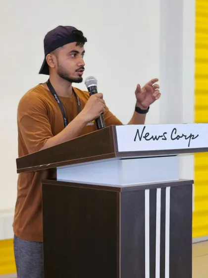 Another shot of me addressing the employees at News Corp. We don't just lead dance routines; we engage with your team to create a motivational experience that lasts beyond the session.