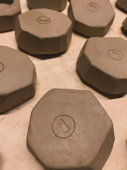 Another angle of the raw, faceted pieces, ready for their transformation in the kiln.