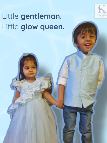 A little gentleman and a little glow queen. This sibling set in powder blue is perfect for formal parties, featuring a smart waistcoat for him and a ruffled dress for her.