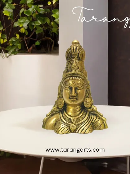 This elegant brass bust of Goddess Parvati radiates grace and devotion. As the divine consort of Lord Shiva, she represents love, strength, and motherhood. It's a beautiful piece to honor the divine feminine in your home.