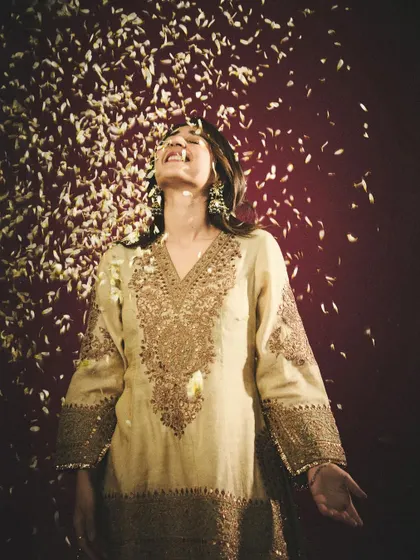 Pure joy. This shot of Dhvani laughing as flower petals fall around her captures the happy, celebratory spirit of festive dressing.
