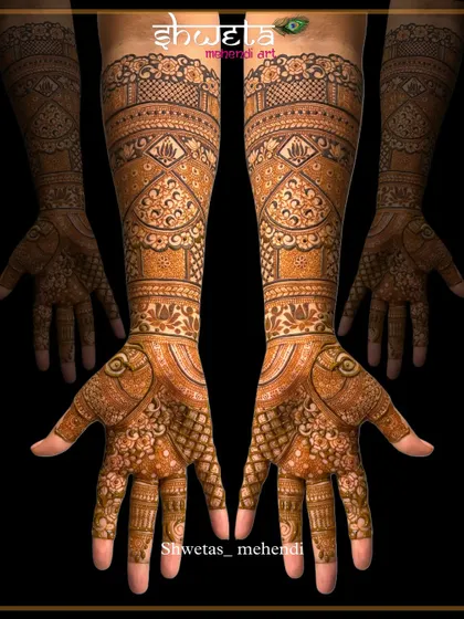 I have a deep love for traditional mehendi art. This design showcases symmetrical patterns and fine-line work, creating a full and rich look that is timeless for any celebration.