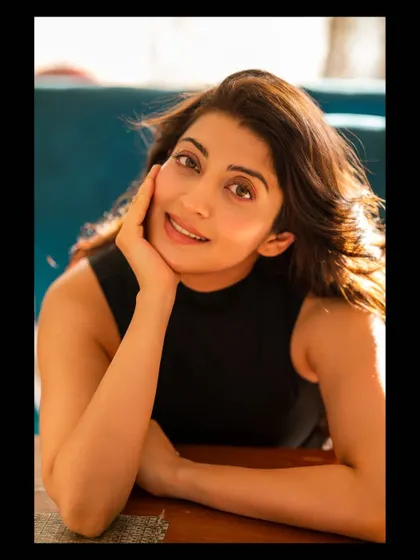 A candid, smiling portrait of Pranitha. This kind of shot is perfect for showing a bright and friendly personality in an actor's portfolio.
