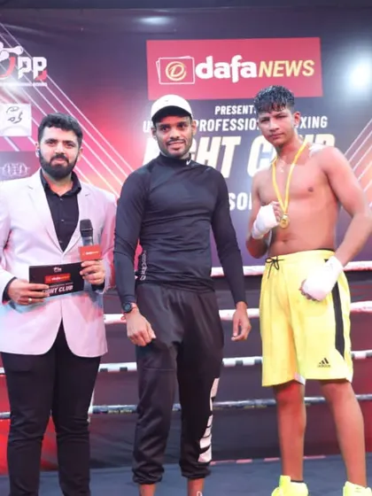 International boxer and Junior Asian Champion Akshay Kumar with one of the night's winners. We bring in top talent to inspire our students.