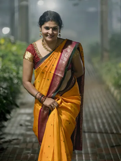 For Karnataka Rajyotsava, I wore a traditional yellow silk saree with a red and green border. This look is a tribute to the rich heritage of my state.