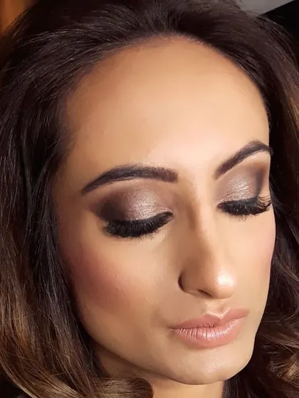 A dramatic and glamorous smokey eye, perfect for a grand evening affair. We use high-quality products to ensure the makeup is intense, well-blended, and long-lasting.