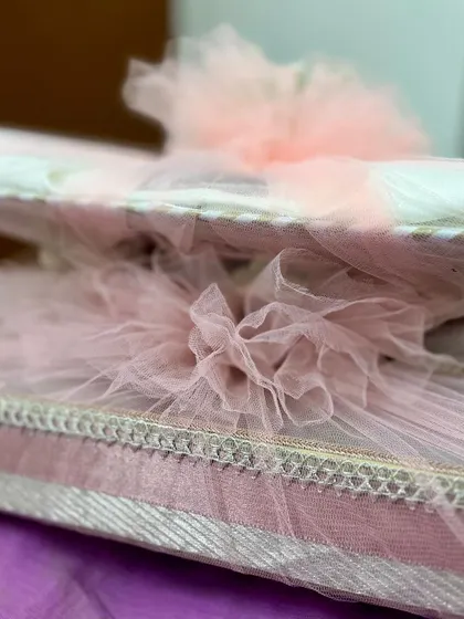 A duplicate image of the delicate tulle wrapping detail.