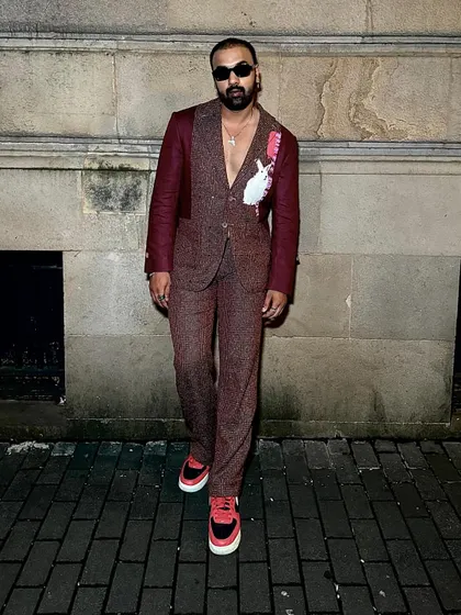 Arshad Ahmed in our Phantasm Suit, an ode to modern sophistication in rich maroon linen.