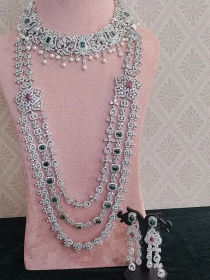 This multi-layered AD stone necklace with green and pink accents is a very regal choice for a reception or engagement.