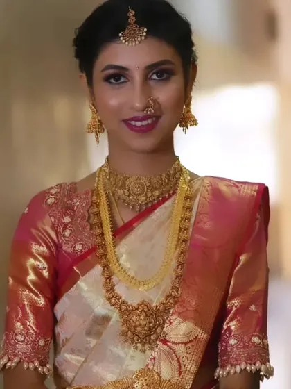 Akshatha's muhurtham look, featuring a soft smile and glowing skin. I aim to make every bride feel comfortable and beautiful, and her expression says it all.