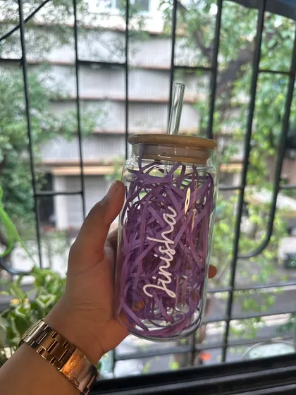 Another angle of the 'Jinisha' glass sipper, showcasing the quality and clarity of the glass and personalization.