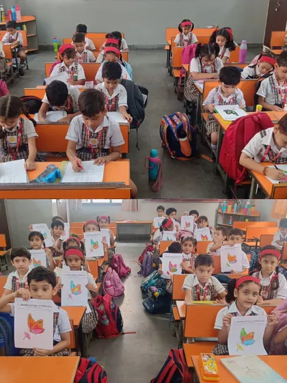 A classroom view at Gayatri Public School during the 2024 Olympiad, with younger students proudly showing their completed coloring sheets.