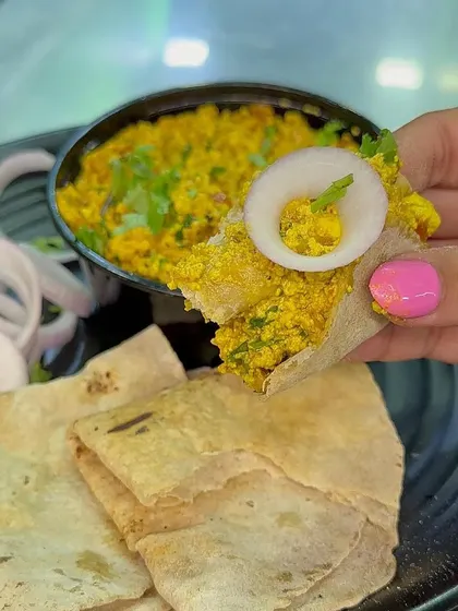 A perfect bite of my Paneer Bhurji with a piece of soft roti. This is a simple, home-style meal that's full of flavor.