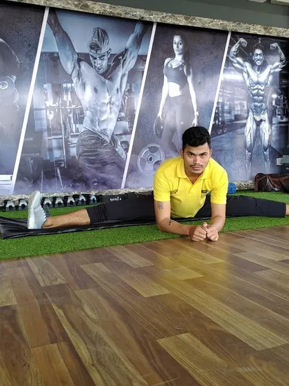 Maintaining the split position. This demonstrates the importance of both flexibility and endurance in static holds.