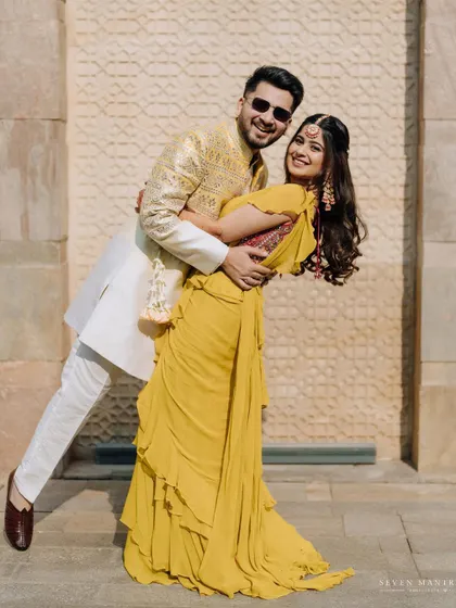 A fun and playful pose. I encourage couples to have fun during their shoot, which results in natural and happy photos.