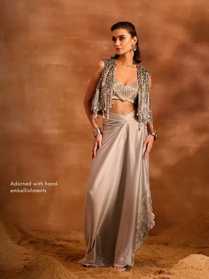The Blaze Co-ord Set, adorned with hand-embellishments, is a standout ensemble designed for a glamorous and fashion-forward look.